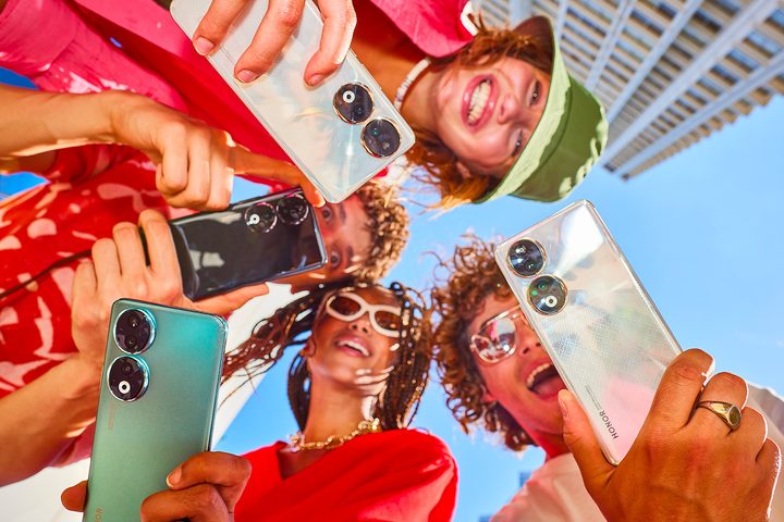 Promotional photo showing the Honor 90 phone in different colors.