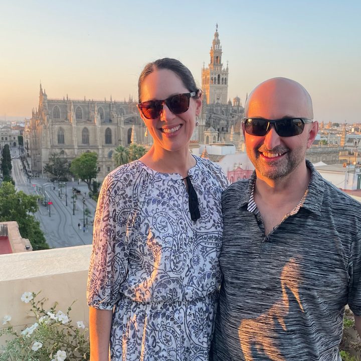 My wife Julie and I participated in a rooftop paella-cooking class during our time in Sevilla, Spain, last month. In the background is the Catedral de Sevilla. This photo was taken with Julie's iPhone 12 after I lost mine.