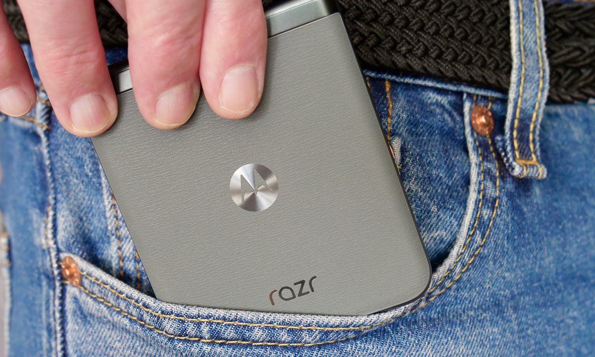 A person taking the Motorola Razr 40 out of a pocket.