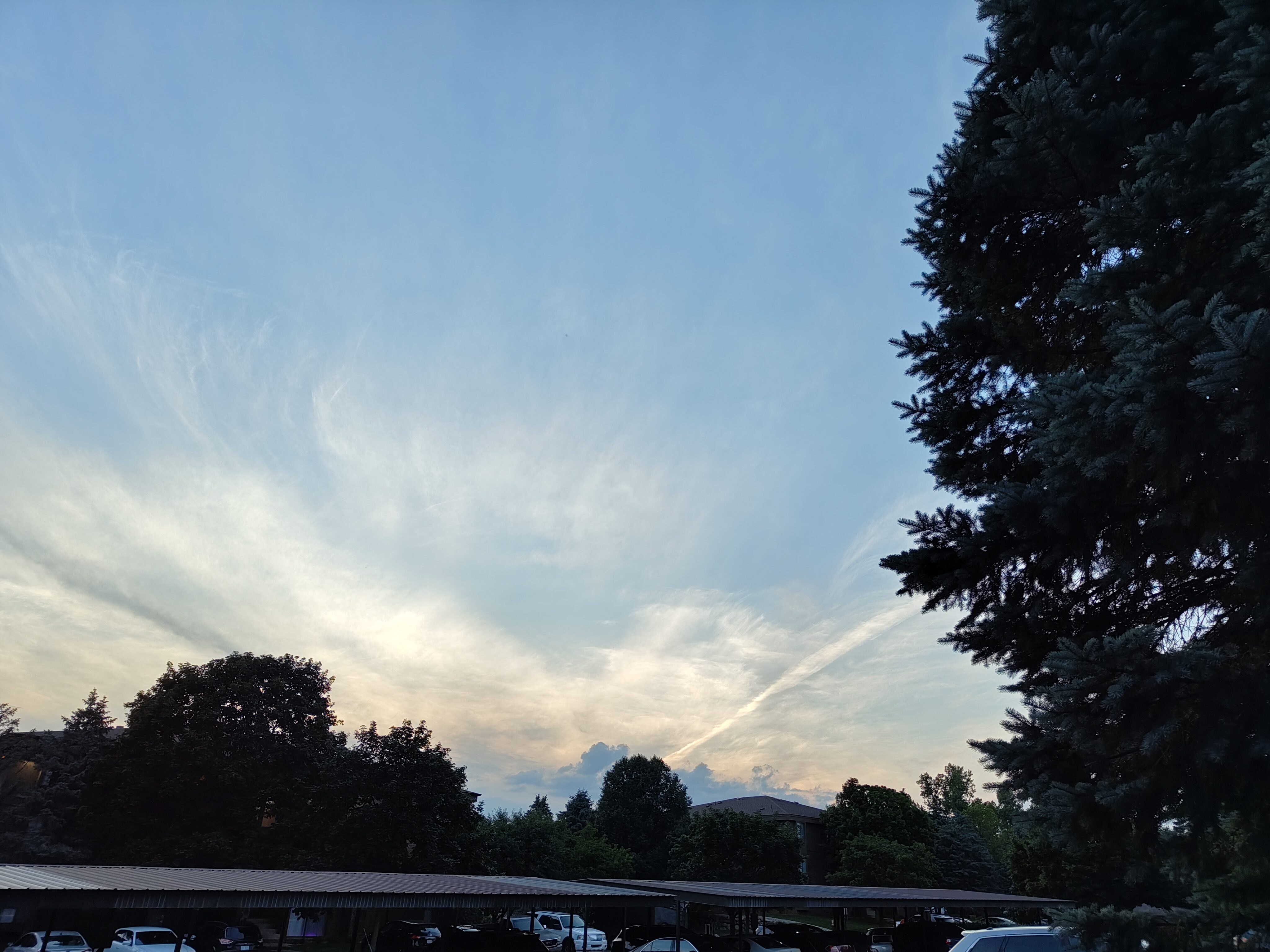 Photo of a blue sky with clouds, taken with the Nothing Phone 2.