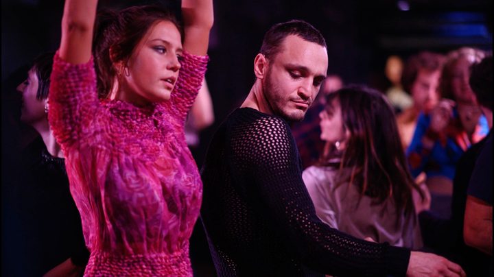 A man and a woman dance in Passages.