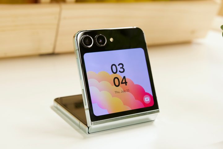 The Samsung Galaxy Z Flip 5 half-folded open.