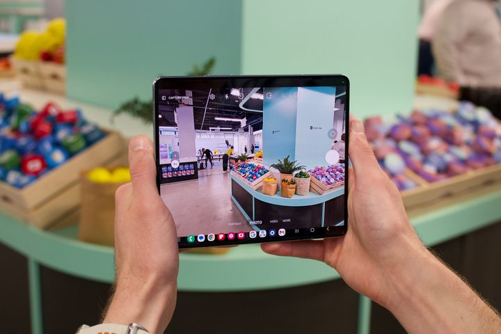 Someone using the Camera app on the Galaxy Z Fold 5.