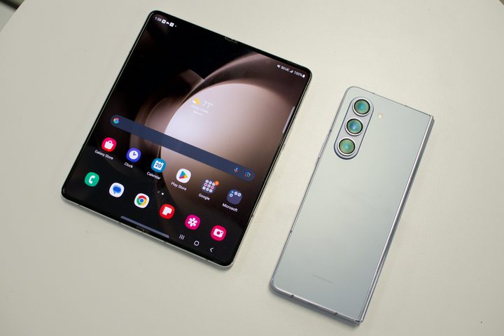 Two Galaxy Z Fold 5 phones next to each other -- one is open and one is closed.