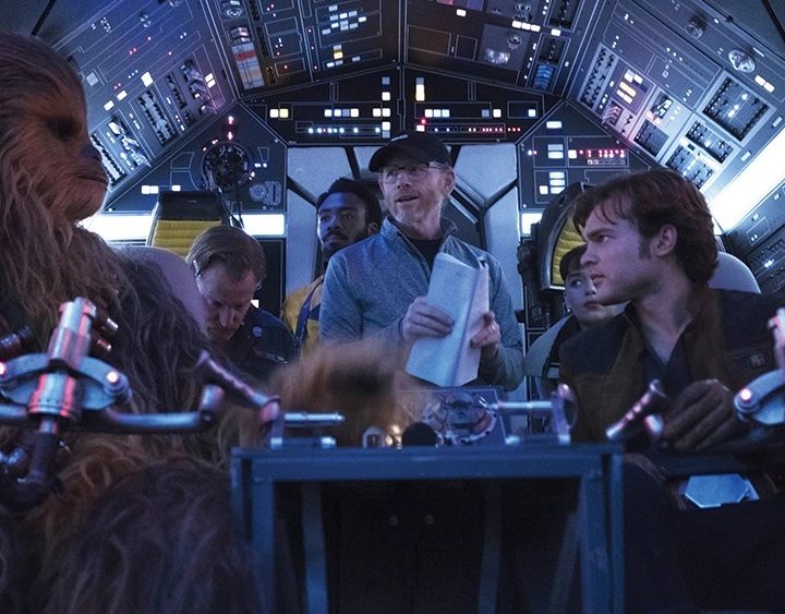 A behind the scenes shot of the cast and director Ron Howard for Solo: A Star Wars Story.