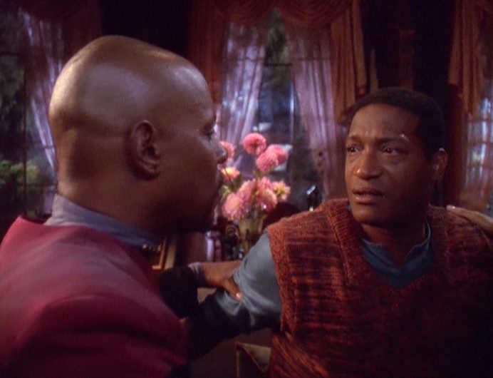 Captain Benjamin Sisko appears in the home of the adult Jake Sisko, who tearfully greets in missing father in the DS9 episode "The Visitor."