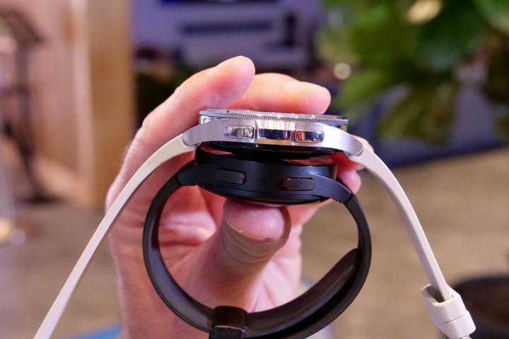 The Samsung Galaxy Watch 6 Classic and Galaxy Watch 5 Pro, showing the side buttons.