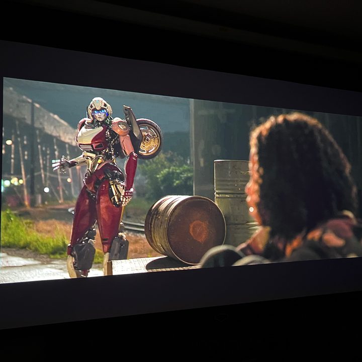 The image from the Xgimi MoGo 2 Pro projector from Transformers in a dark room.