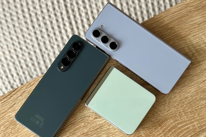 Samsung Galaxy Z Fold 5, Galaxy Z Fold 4, and Galaxy Z Flip 5 resting on a table.