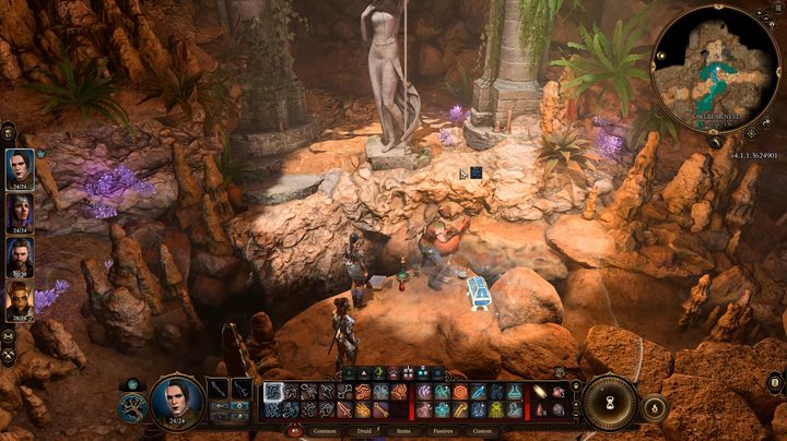 A party in a cave jumping across a gap.