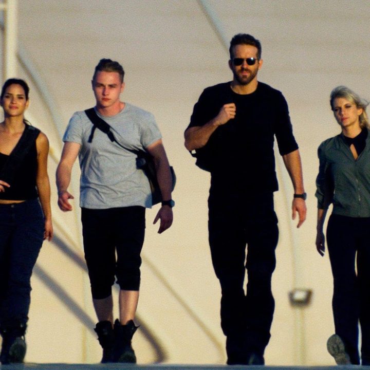 A group of soldiers walk in unison in 6 Underground.