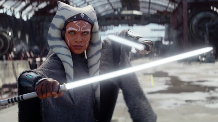 Rosario Dawson as Ahsoka dual-wielding her white lightsabers in the Disney+ series.