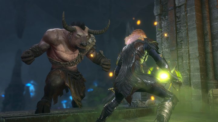 A wizard charges a spell to hit a minataur.