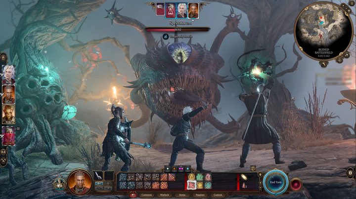 A team of warriors fighting a big eyeball snake.