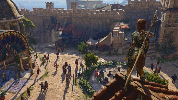 A knight standing on a roof above a village.