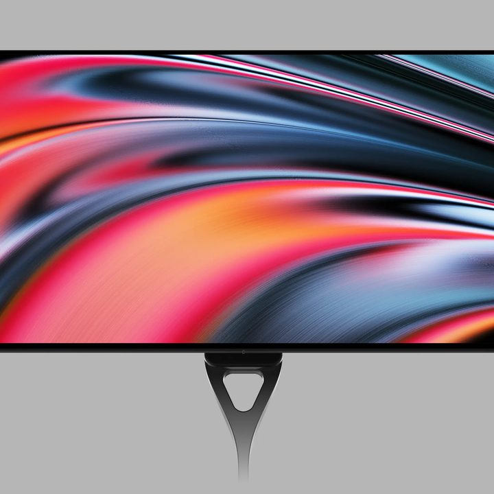 The Dough Spectrum Black 32-inch monitor over a grey background.