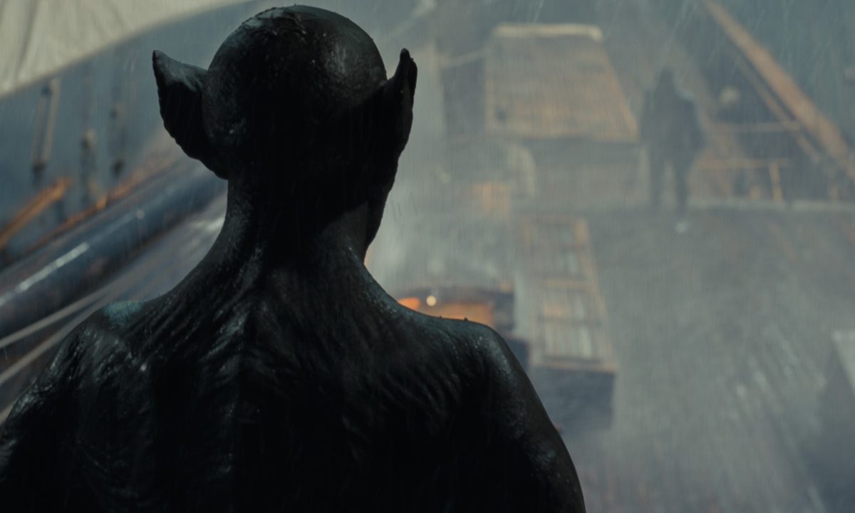 Dracula surveys his prey from above the deck of the ship in a still from the movie Last Voyage of the Demeter