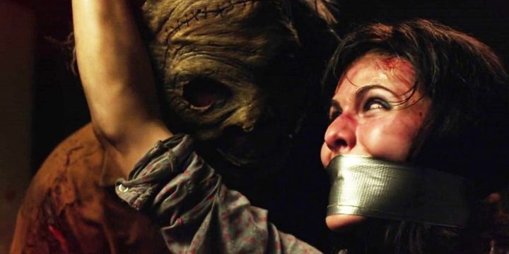 Leatherface grabs a young victim