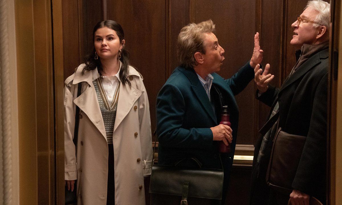 Mabel, Oliver, and Charles stand in an elevator together in Only Murders in the Building Season 3.