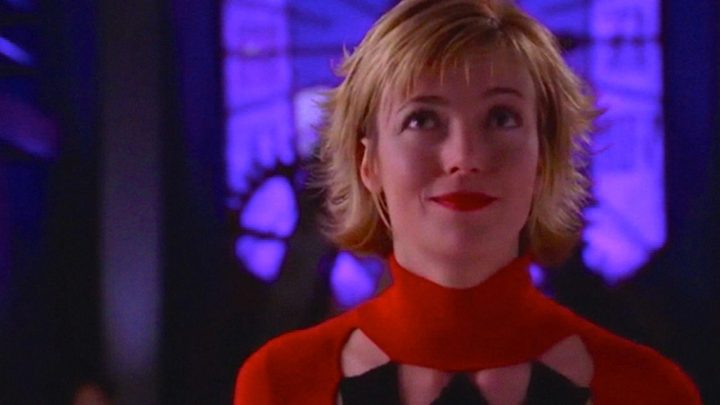 Mia Sara as Dr. Harleen Quinzel smiling in the show Birds of Prey.