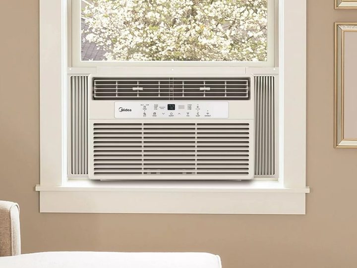The Midea MAW08S1WWT in a window.
