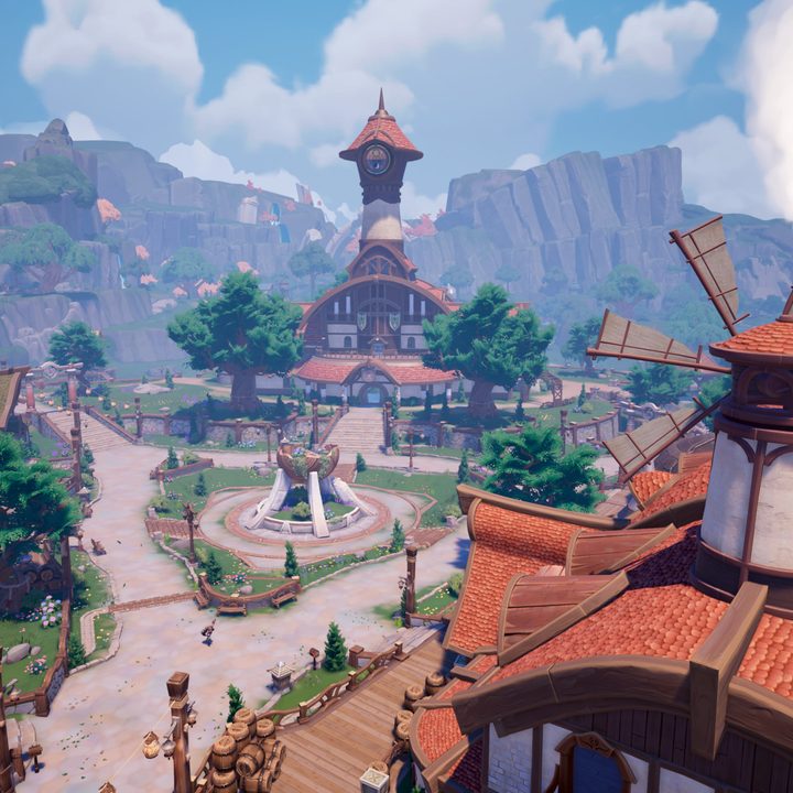 A shot of Kilima Village. The main building at the center of the village features a large tower. All the buildings have light brown roofs and are mostly made out of white siding. Smoke rises out of the chimneys.