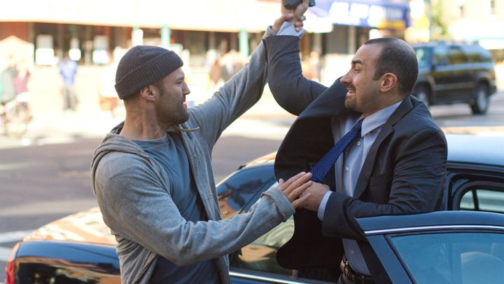 Jason Statham fights a bad guy in Safe.