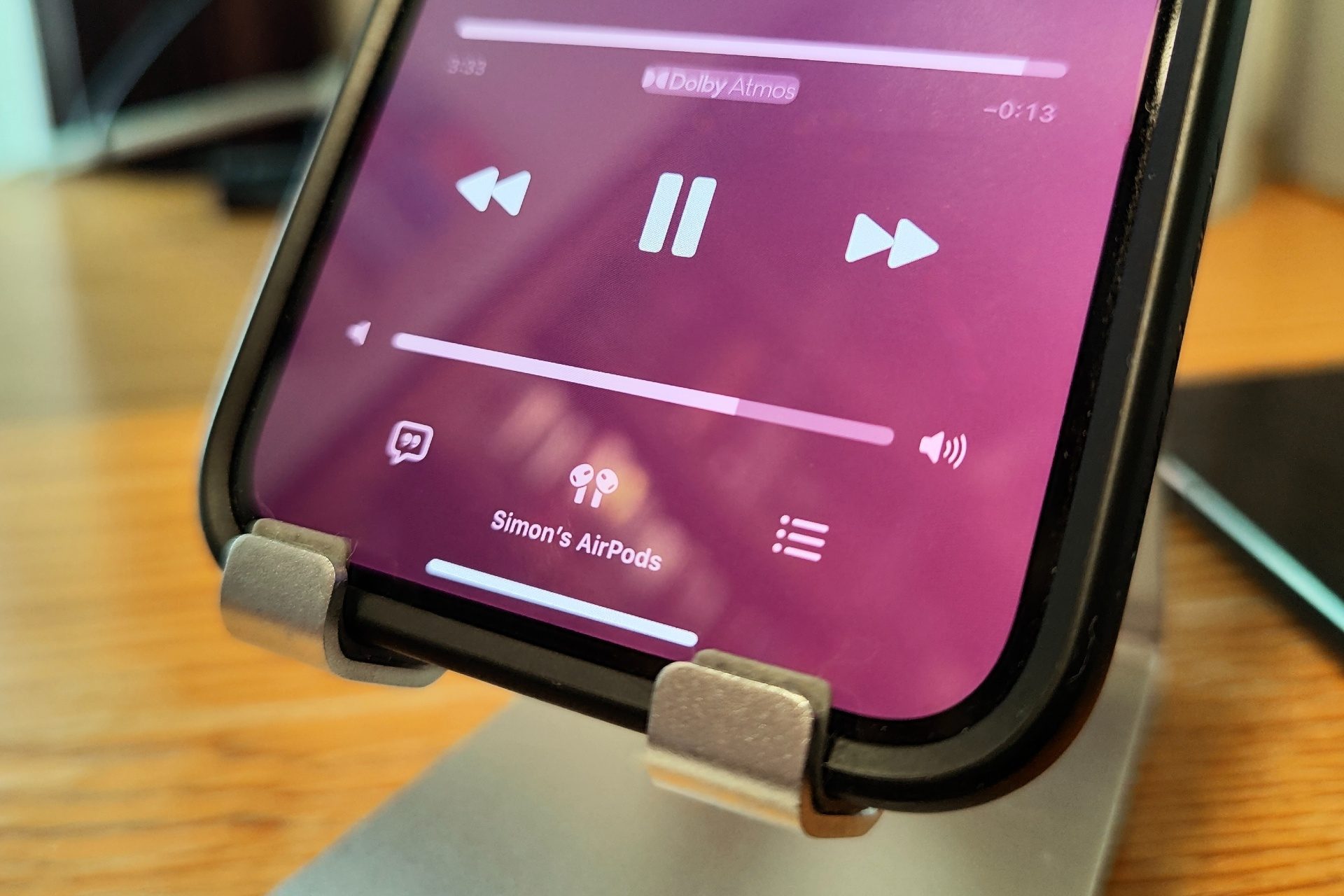On-screen volume adjustment for AirPods using Apple Music.