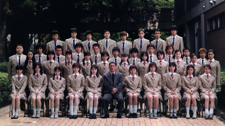 The cast of Battle Royale assemble for a photo.