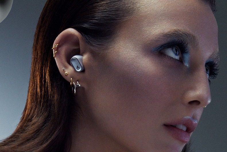 Beats Studio Buds+ in new Cosmic Silver worn by Emma Chamberlain.