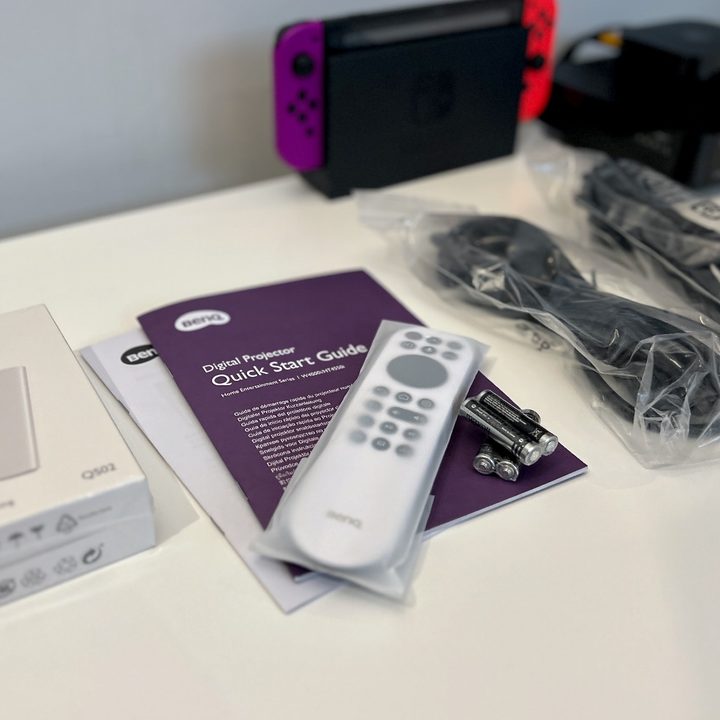 The contents of the BenQ HT4550i projector during setup.