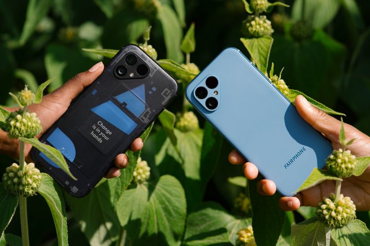 Two people holding a Fairphone 5 each.