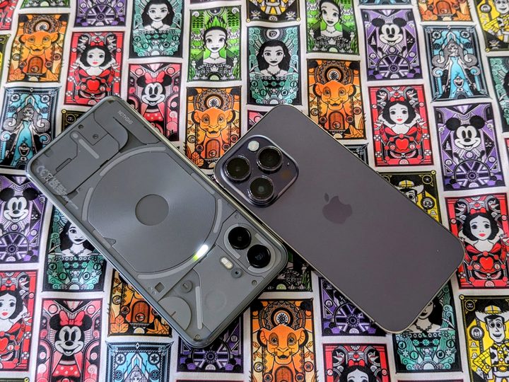 Nothing Phone 2 and Deep Purple iPhone 14 Pro camera modules compared.