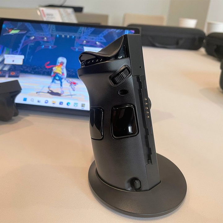 A Lenovo Legion Go controllers stands up on a table.