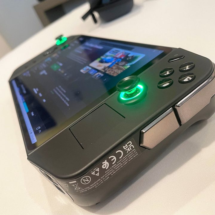 A Lenovo Legion Go rests on a table.