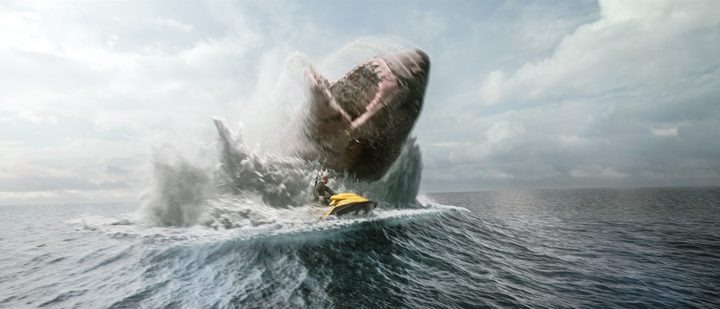 A skier races away from a giant shark in The Meg 2.