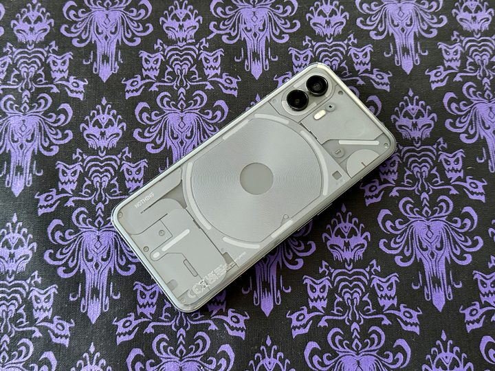 Nothing Phone 2 unlit on a Haunted Mansion placemat.