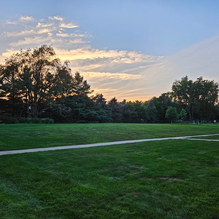 A photo from the Samsung Galaxy Z Flip 5, showing a courtyard during a sunset.
