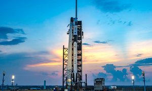 Crew-7's Falcon 9 rocket and Dragon spacecraft on the launchpad.