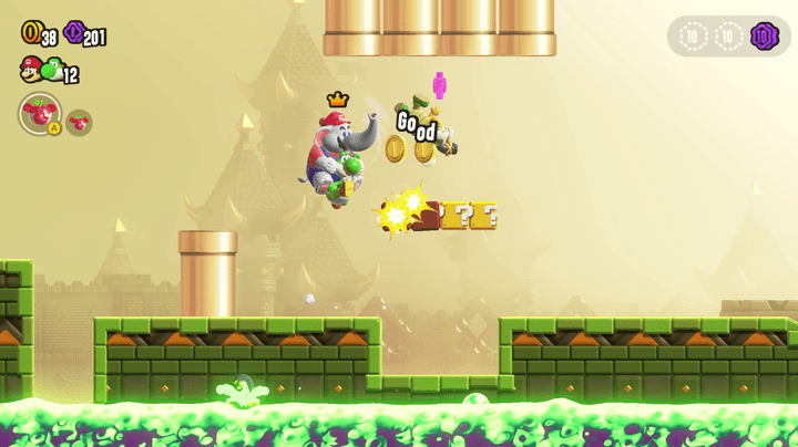 Elephant Mario rides Yoshi in Super Mario Wonder.