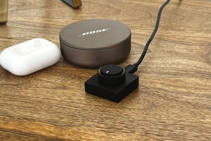 The Ultrahuman Air on its charging plinth.