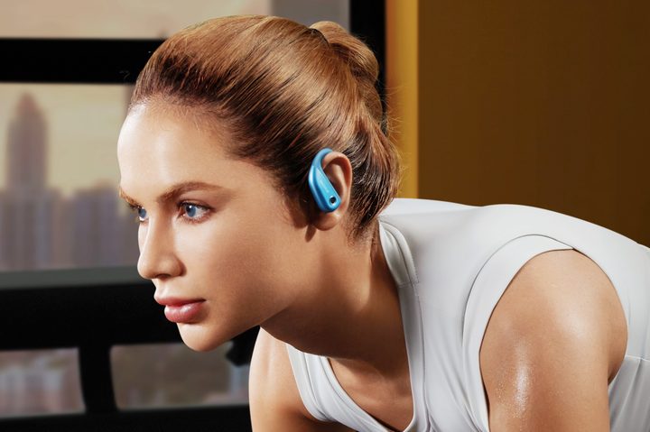 Woman wearing 1More Fit S50.