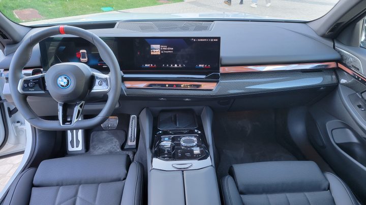 The BMW i5 features a wraparound LCD screen.