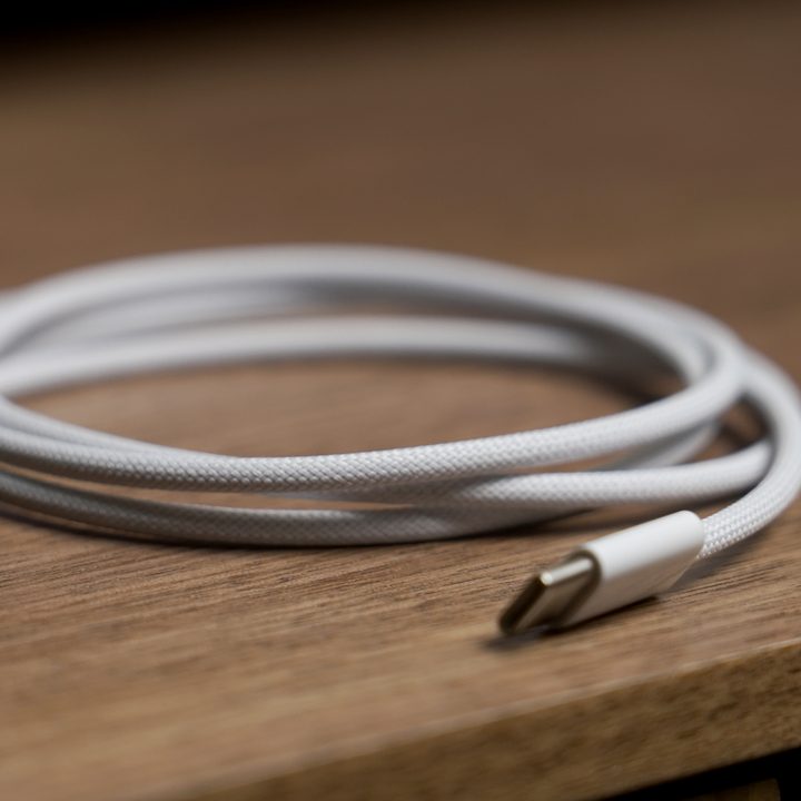 The cloth-covered Apple AirPods Pro 2 with USB-C and MagSafe charging cable.