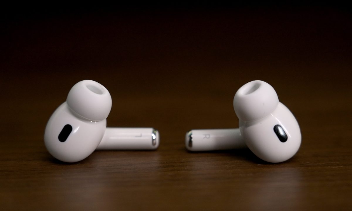 The left and right Apple AirPods Pro 2 lying on a table.