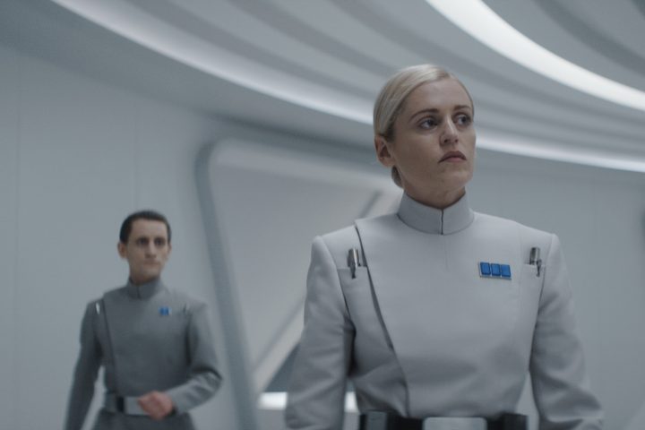 Dedra walks ahead of a fellow Imperial Official in Andor season 1.