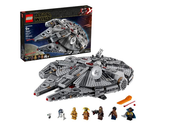 The Lego Star Wars Millennium Falcon on a white background with its box.