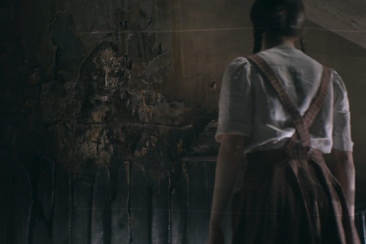 Sophie looks at an outline of Valak in The Nun 2.