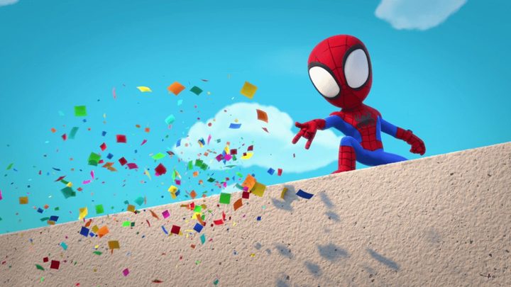 Spider-Man throwing confetti from a rooftoop in Spidey and His Amazing Friends.