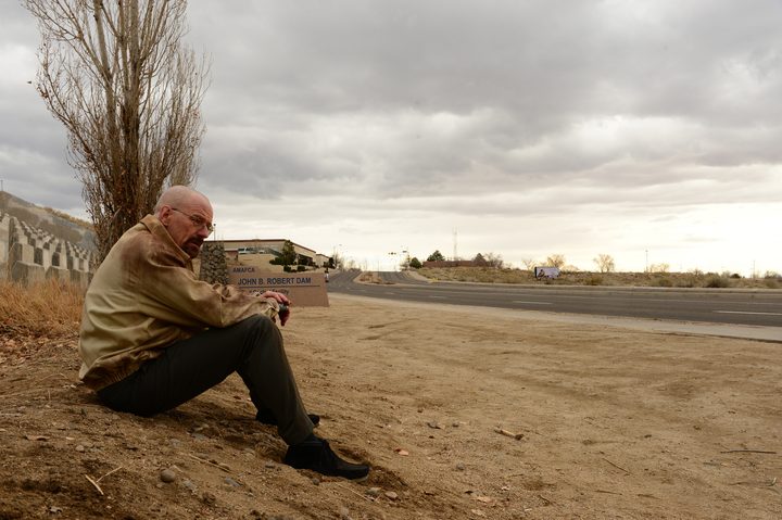 Walter White sits by the side of the road in Breaking Bad season 5.